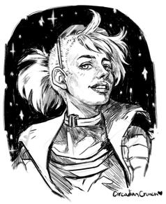 A young woman grins. She has a thick collar necklace and sunglasses pushed back onto her head.